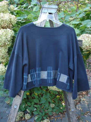 1999 Interlock Side Tie Jacket Fall Grid Black Size 2, displayed on a hanger, features wide three-quarter sleeves and a stitched motif hem, reflecting Bluefishfinder.com's vintage individuality.