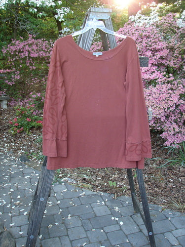 Barclay Cotton Lycra Bell Sleeved Vented Top Paisley Rust Size 2 displayed on a swing, showcasing long belled sleeves with painted panels and dual vented sides.