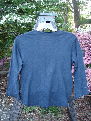 Barclay Hemp Cotton Long Pinch Sleeved Shrug Unpainted Navy Size 1 displayed on a hanger, featuring a deep V neckline, front tie wrap, seamless back, curly edges, and pinched sleeve accents.