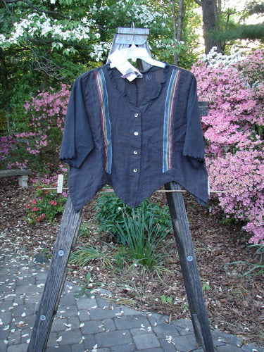 Barclay NWT Linen Scallop Crop Grid Jacket Black Stripe Size 1 displayed on a wooden ladder, featuring fluttery collar, scalloped hemline, and pearly buttons. From BlueFishFinder's vintage collection by Jennifer Barclay.