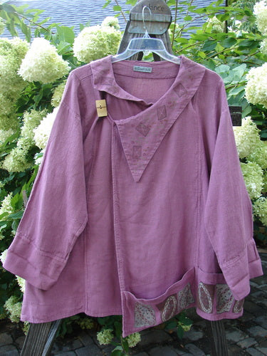 Barclay Hemp Vienna Toggle Collar Jacket in Step Stone Peony, Size 2: A substantial jacket with folded layered neckline, wooden toggle, and varying hemline with horizontal pockets. Exterior stitchery and widening A-line shape. Made from heavy hemp linen.