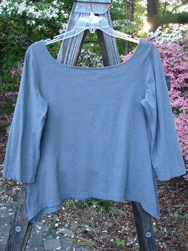 Barclay Cotton Lycra Square Neck Pinch Pullover Unpainted Grey Sky Size 1 displayed on a swinger, showcasing its wide square neckline, vertical pinch accents, and slightly varying hemline.