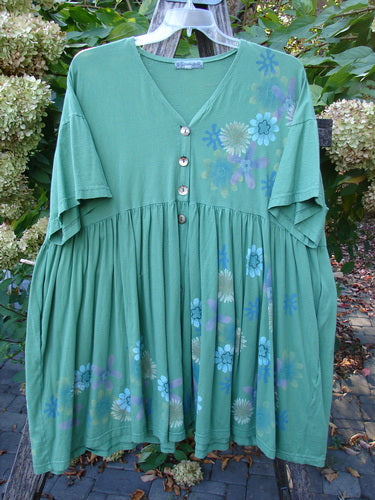 Barclay Tree Top Cardigan Dress Floral Blossom Spearmint Size 3, showcasing a V-neckline, vintage buttons, and a gathered waist in a baby doll style, creating a flared, floral-printed skirt.