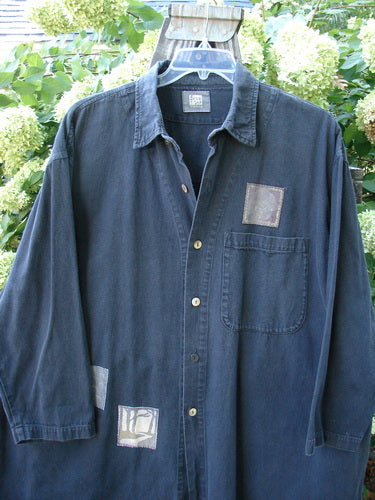 1998 Limited Edition Men's Patched Denim Work Shirt on a wooden ladder close up of patches.