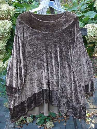 1997 Velvet Surya Top Subtle Celtic Border Mandorla OSFA features a luxurious crushed velvet fabric, swingy hemline, and Celtic border design, showcasing its unique shape and detailing against a natural foliage backdrop.