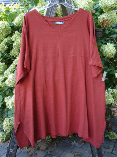 Barclay Linen Viscose Vented Urchin Dress Unpainted Brick Stripe Size 2: A red dress with a V-shaped neckline, three-quarter length sleeves, and vented sides.