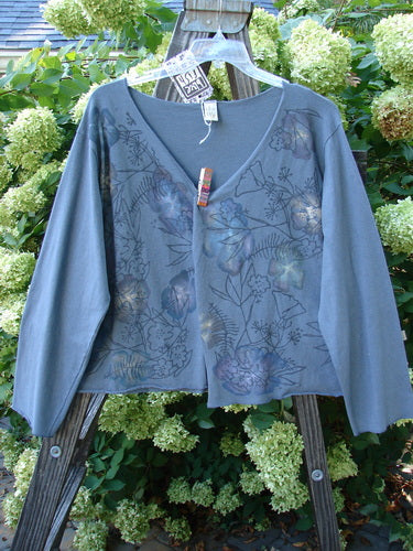 Barclay NWT Layering Cardigan Shrug with Rain Flower Design, Blue Dusk, Size 2. A medium weight cotton lycra sweater with an open front and trailing rain flower theme paint.