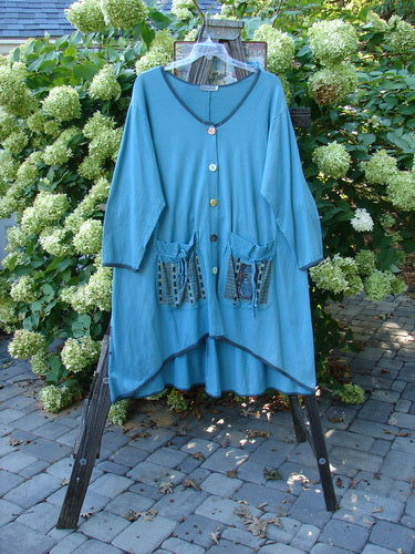 Barclay Cotton Hemp Contrast Tie Pocket Jacket Seahorse Watercolor Size 2: A blue dress with pockets on a rack.