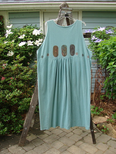Vintage 1993 Button Jumper with Carved Stone Theme, Ocean, Size 2. Features V-neck, wooden buttons, tunnel pockets, and whimsical details. Bust 56, Waist 56, Hips 56, Length 55. From BlueFishFinder.com.