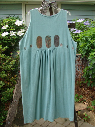 Vintage 1993 Button Jumper with Carved Stone Theme, Ocean, Size 2, from BlueFishFinder.com. Features V-neck, wooden buttons, tunnel pockets, and whimsical paint. Bust 56, Waist 56, Hips 56, Length 55.
