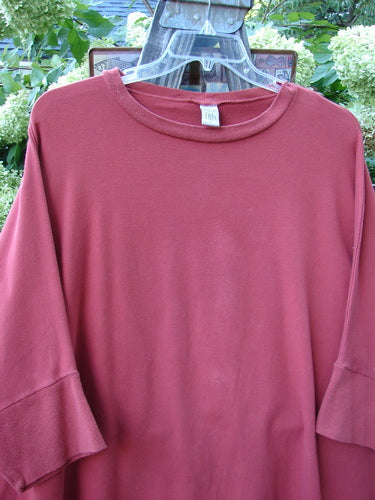 Barclay Cotton Lycra Banded Sleeve Dolman Top in Mystic Sunset, Size 2. A red shirt on a swinger with dolman banded lower sleeves.