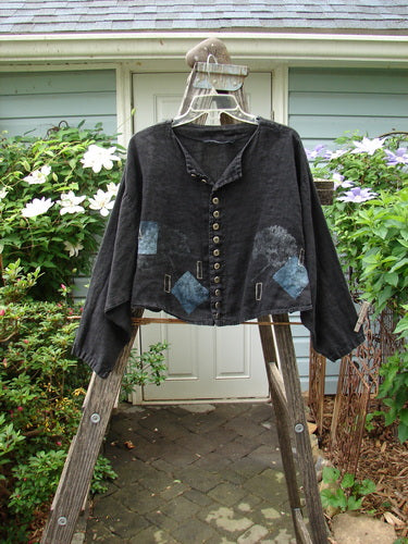 1997 Cayman Shirt Coral Reef Ebony Size 1 on a wooden ladder, showcasing a unique hemline, 13 metal buttons, drop shoulders, and sea life theme paint, highlighting vintage Blue Fish Clothing's creativity.