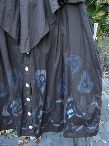 Barclay Batiste Split Button Pant Skirt Celtic Mocha Size 0, showcasing blue stenciled patterns along the hem and white buttons, draped over a bench, embodying Bluefishfinder.com's vintage charm and creativity.