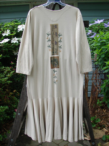 Vintage 1994 Column Dress with Magic Star Design in Mist, Size 2, on wooden ladder. Features V-neck, long sleeves, full button front, and flared bottom. From BlueFishFinder's collection of unique, expressive clothing.