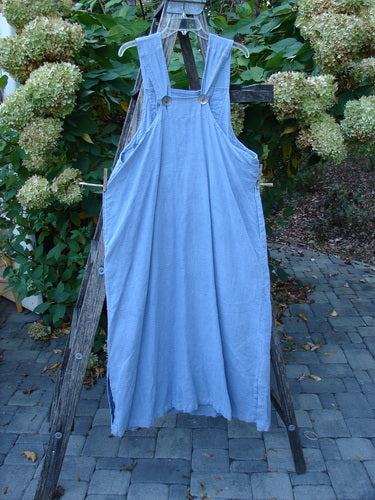 1999 Summercloth Suspender Overall Jumper Unpainted Bluestone Size 1 displayed on a wooden stepladder, showcasing its sturdy shoulder straps, oversized metal buttons, empire waist seam, and dual deep side pockets.