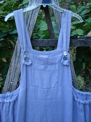 2000 Hemp Summercloth Hi Way Overall Jumper Star Border Twilight Size 2 features adjustable button straps, a front pocketed bib, and generous pockets. Draped elegantly, showcasing BlueFishFinder’s vintage-inspired, creative fashion ethos.