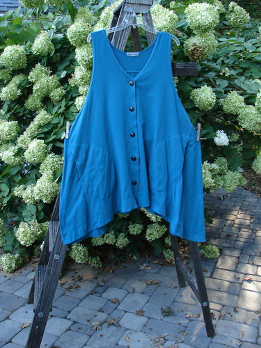 Barclay Column Vest Unpainted Royal Teal Size 2: Swingy shape, yoked back panel, banded hemline, dark buttons. Organic cotton. Bust 19, Waist 54, Hips 60, Hem 100, Front Length 33, Side Lengths 38.