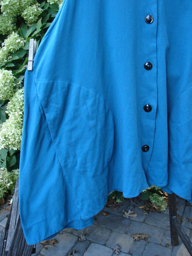 Barclay Column Vest Unpainted Royal Teal Size 2: Swingy shape, dark buttons, side seam pockets, varying hemline. Organic cotton.
