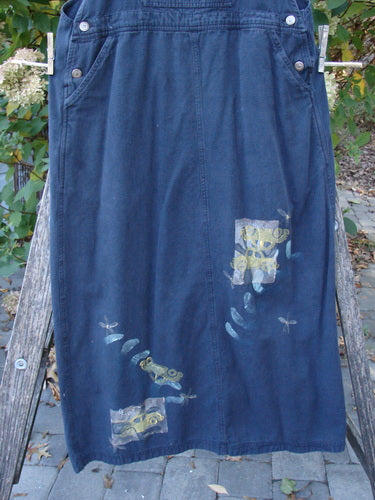 1996 Denim Overall Jumper Truck Travel Black Size 1 with cartoonish frogs, sturdy adjustable straps, and metal button side adjustments, hanging outdoors, showcasing Blue Fish's creative and vintage style.