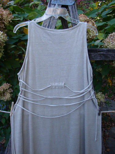 1998 Linen Knit Wrap Dress Unpainted Natural Size 1, featuring a sleeveless design with multiple fabric ties across the back. The dress showcases a graceful drape and elegant straight bodice.