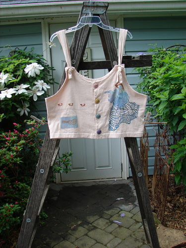 1996 Boxcar Vest Travel Music White Pine Size 1 displayed on a wooden ladder, featuring adjustable shoulder straps, multicolored buttons, and a bright blue patch.