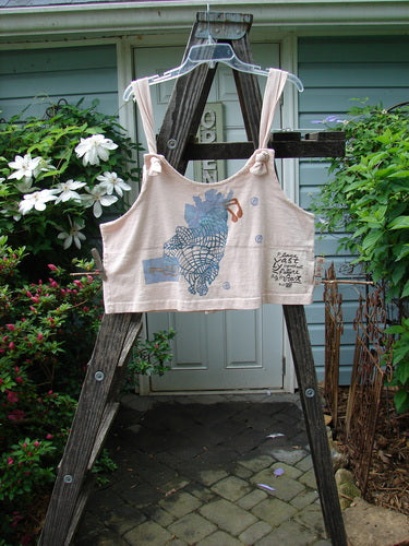 1996 Boxcar Vest Travel Music White Pine Size 1 displayed on a wooden ladder, featuring adjustable shoulder straps and multi-colored scribe buttons, highlighting the vest's detailed craftsmanship and versatility.