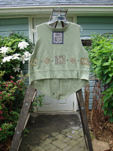 Vintage 1995 Button Vest with Wind and Rain Theme from BlueFishFinder. Altered for a slimmer fit, featuring tiny front buttons, pockets with loop closures, varying hemlines, and a unique Blue Fish patch. Made of double-layered cotton jersey.