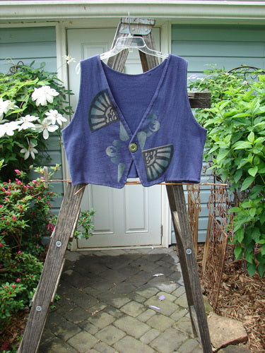 Vintage 1995 Reprocessed Jazz Vest from Royal Orchid. Features a deep V neck, contrasting pointed hemline, and signature blue fish patch. Perfect condition. Size 1. Reflects BlueFishFinder's ethos of creative individuality.