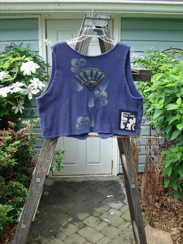 Vintage 1995 Reprocessed Jazz Vest from Royal Orchid with Fancy Fan Theme. Features a deep V neck, contrasting hemlines, and a signature blue fish patch. Perfect condition. Size 1.