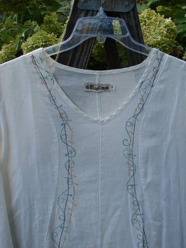 Barclay Linen Venetian Tunic Dress: A white shirt with beautiful embroidery, curved seams, and a softly dipped V neckline. Size 1.