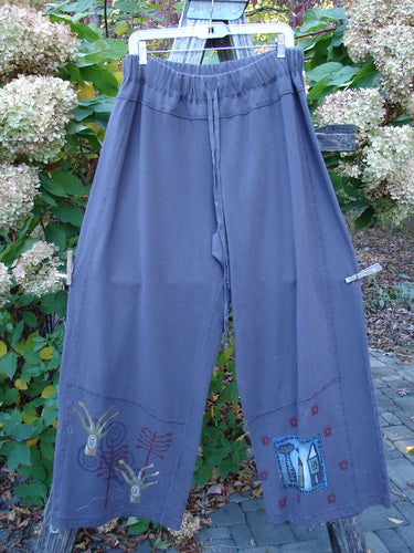 Barclay Wide Leg Bottom Panel Pant Treehouse Brum Size 2, featuring elastic waist with drawstring, decorative stitching, and treehouse-themed motifs, displayed outdoors against garden foliage, reflecting Bluefishfinder.com's vintage, creative clothing style.
