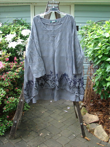 Barclay Linen Rayon High Low Tie Back Dress Shadow Border Night Sky Size 2 displayed on a clothes rack.