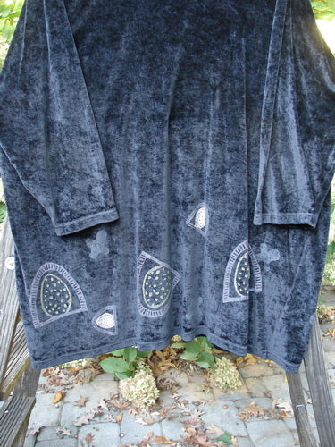 1996 Velvet Mythical Top with Primitive Abstract design on a blue robe hanging on a clothesline. Perfect condition. Size 2.