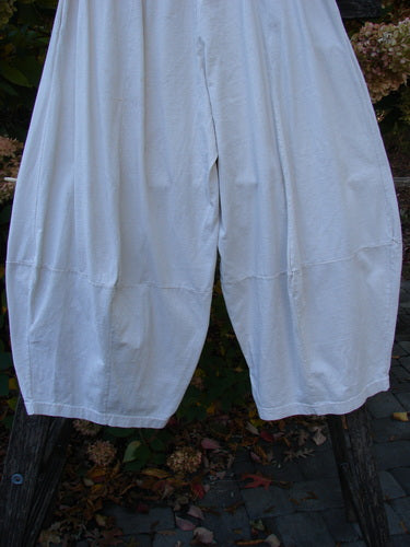 1999 4 Square Pant Unpainted Natural Size 1, featuring a unique 3D diamond cut from the knee, hanging outdoors. Loose-fitting with elastic waistband and deep side pockets, showcasing BlueFishFinder's vintage style.