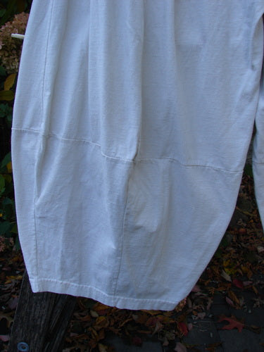 The image displays the 1999 4 Square Pant Unpainted Natural Size 1, showcasing its unique 3D diamond cut from the knee down, with visible deep side pockets and a full elastic waistband.