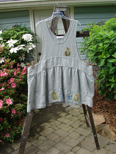 Vintage 1998 Botanicals Leafhopper Jumper Apron featuring a Single Tulip design, from BlueFishFinder. Heavy Linen, Double Paneled Waist, Scooped Neckline, and Dropped Sides. Perfect for Layering. One Size Fits All.