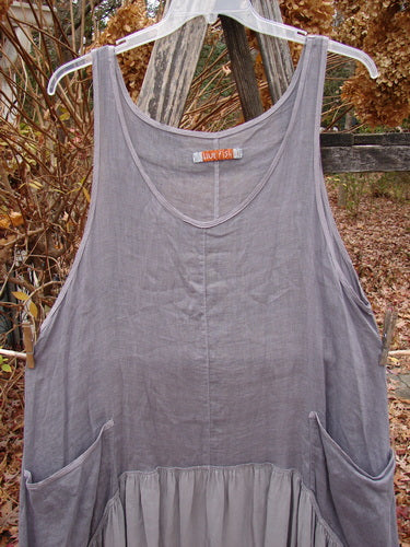Barclay Gauze Silk Summer Frock Jumper in Unpainted Grey Haze, Size 1, with scoop neckline, sleeveless cotton gauze upper, silk lower flounce, side seam pockets, hanging outdoors.