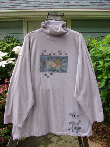 Barclay Philosophy Turtleneck Tunic featuring Epic Woman theme paint, Lavender, Size 3. Generous square shape, ribbed turtleneck, wide sleeves. Vintage Blue Fish Clothing from BlueFishFinder.com, empowering women's individuality since 1986.