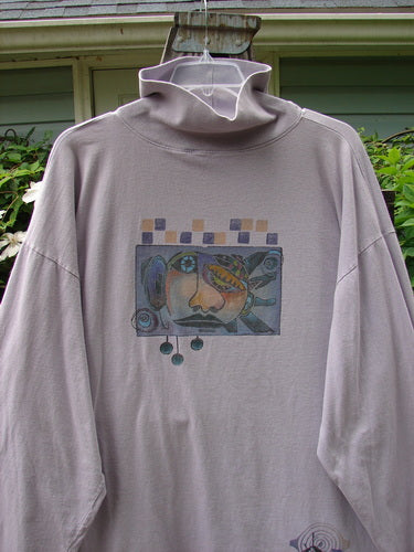 Barclay Philosophy Turtleneck Tunic featuring Epic Woman theme in Lavender, Size 3. Grey sweatshirt with a face and painting details. Vintage Blue Fish Clothing by Jennifer Barclay.