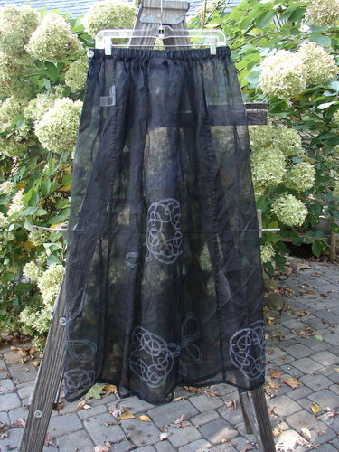 2000 NWT Silk Organza Skirt, black, size 2. A lined flare with vertical sectional panels, waist tie, and waist vent. Length: 40".
