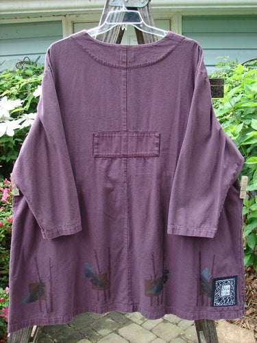 Vintage 1999 Denim Romper Tunic Dress with Forest Leaf Theme, Plum Wine, Size 2, from BlueFishFinder.com. Features bib pockets, cargo-style pockets, rounded neckline, and unique forest leaf paint accents.