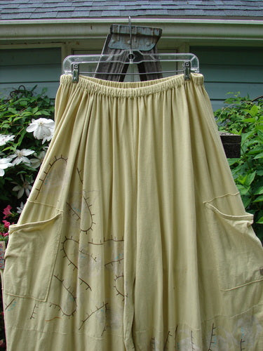 Barclay Hemstitch 4 Square Side Pocket Pant Pathway Plantain Size 2 displayed on a swinger, showcasing unique 3D diamond drape from knee down and exterior drop side pockets.