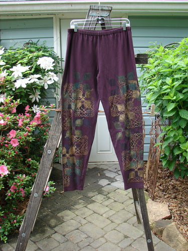 Barclay Cotton Lycra Relaxed Legging featuring Metallic Celtic Theme on Maroon, Size 2, from BlueFishFinder. Perfect condition, medium weight hemp cotton, elastic waist, generous hip, longer relaxed leg. Measurements: Waist 30-40, Hips 44, Inseam 29, Length 40.