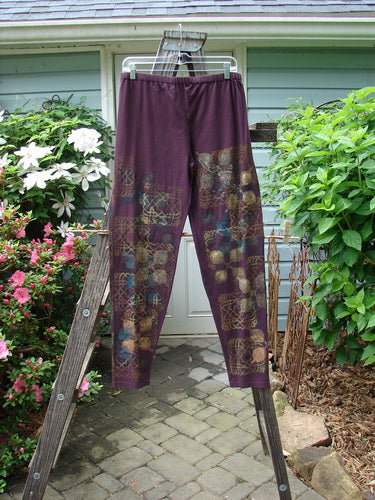 Barclay Cotton Lycra Relaxed Legging featuring Metallic Celtic Theme in Maroon, Size 2, from BlueFishFinder. Perfect condition, medium weight hemp cotton, elastic waistline, generous hip, longer relaxed leg. Ideal fall layering piece.