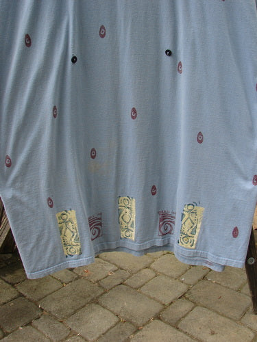 Vintage 1991 Shape Dress by Blue Clover, featuring sectional panels, drop shoulders, wide neckline, and unique square panels. Made from mid-weight cotton with original blue fish buttons. From BlueFishFinder.com.