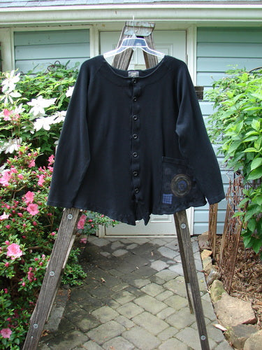 Vintage 2000 Moonlight Cardigan Jacket in Black, Size 2, from BlueFishFinder. Swingy silhouette with oversized pocket, rounded hemline, and rear pleats for a unique look. Perfect for creative self-expression.