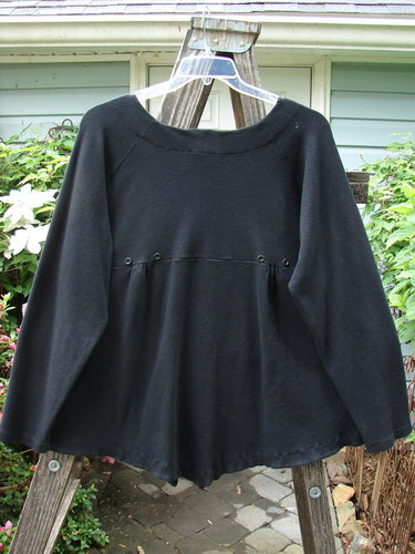 Vintage 2000 Moonlight Cardigan Jacket in Black, Size 2, from BlueFishFinder. Swingy silhouette with oversized pocket, rounded hem, and rear pleats for a unique back swing. Perfect for creative self-expression.