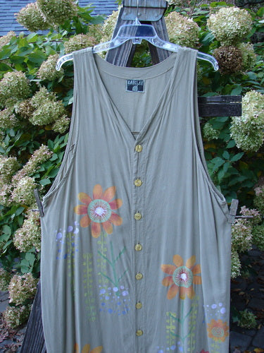 A Barclay Tencel Long Vent Vest in Seed with Tall Stem Florals, featuring a deep V neckline, elongating arm openings, and a scalloped hemline.