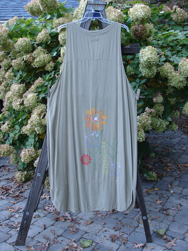 Barclay Tencel Long Vent Vest with Tall Stem Floral design in Seed color. Deep V neckline, elongating arm openings, and scalloped hemline. Full pearly shell button front. Light-weight fabric. Size 1.