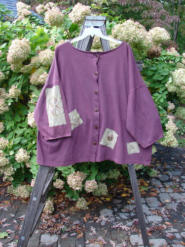 A purple Barclay PMU Patched Cotton Hemp Big Square Shirt with patches from the 1996 Fall Season. Features include a button front, drop shoulders, and a wide square box shape. Size 3, in dusty maroon.